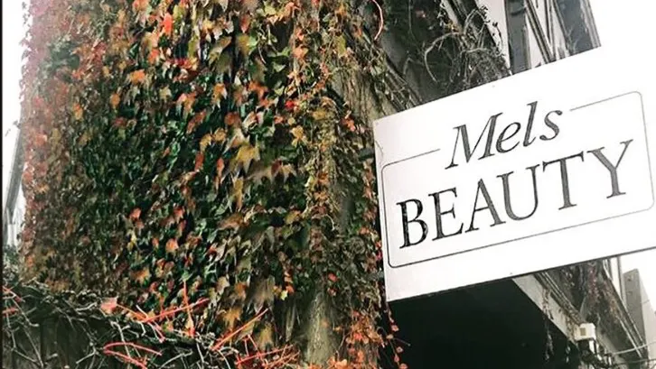 Mel's Beauty sign: Brazilian waxing, spray tanning, lash lift